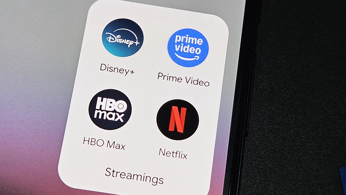 Ícones de aplicativos de streaming representando o aumento das assinaturas digitais